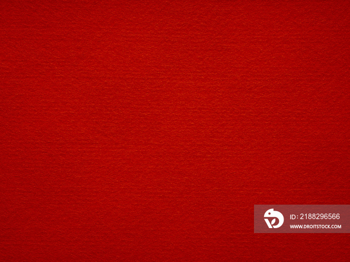 Red felt texture closeup. Saturated background for Christmas desktop, holiday New Year, xmas seasonal decoration, valentin day, text, lettering, patchworkor, party greeting and wedding card element.