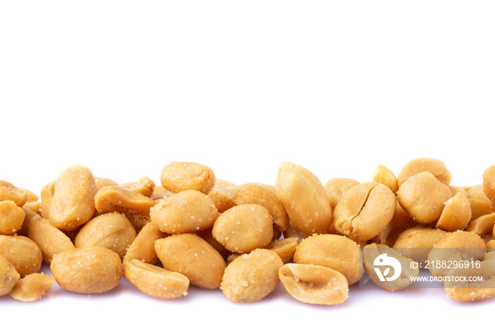 Roasted salted peanuts isolated on a white background