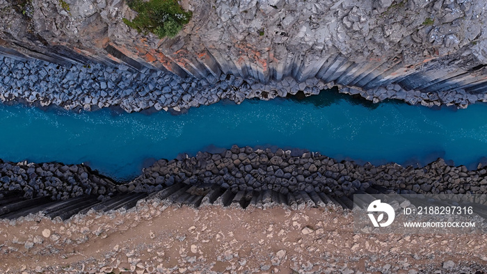 studlagil canyon, extraordinary canyon with blue glacial river