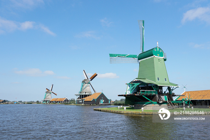 A windmill is a structure that converts wind power into rotational energy by means of vanes called sails or blades, specifically to mill grain (gristmill).