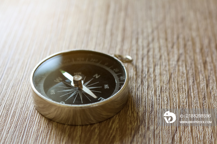 compass on wooden background