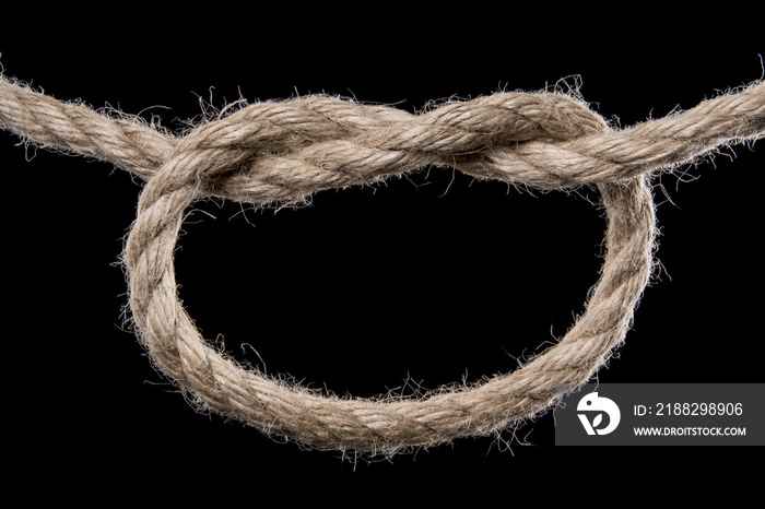 Ship rope with large loop. Isolated on black background. With copy space text. Studio Shot.