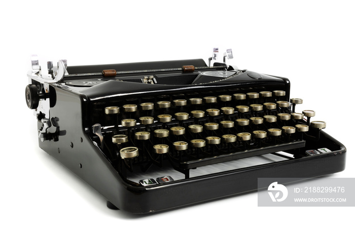 Old retro vintage typewriter in black color isolated on white background