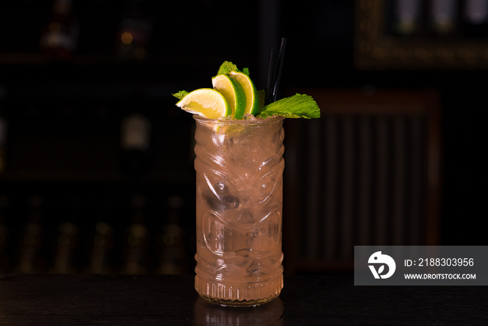 Zombie cocktail on a bar counter in a nightclub