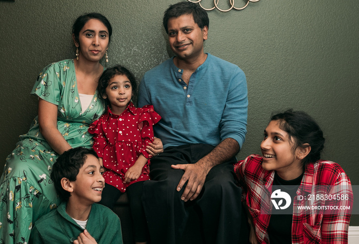 A Family portrait during thanksgiving with funny expressions