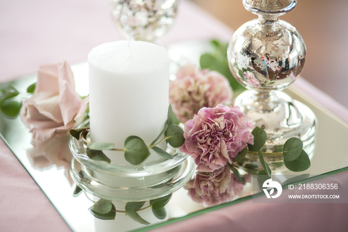 banquet pink table decorated with fresh flowers and candles. Wedding decoration concept