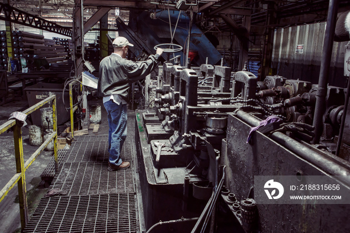 Worker in industrial workshop