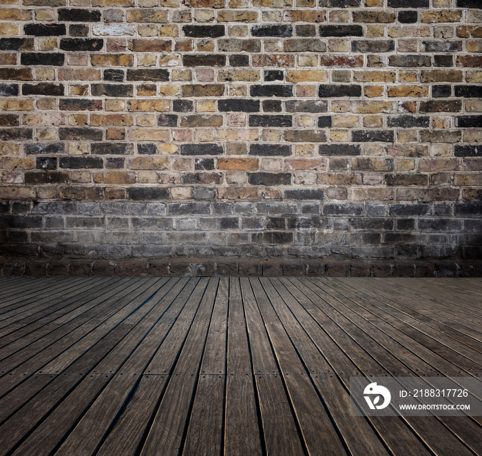 room with bricks wall and wooden floor