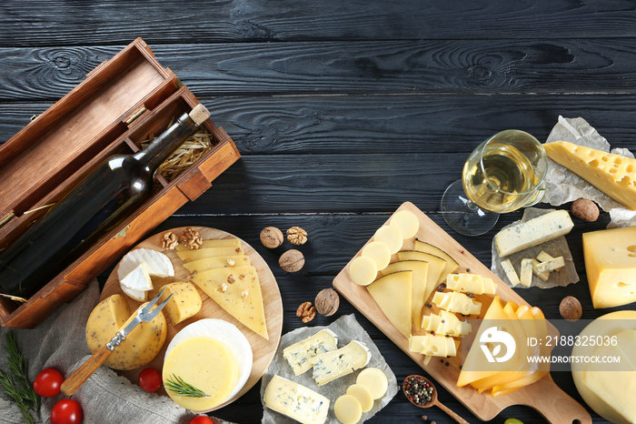 Beautiful composition with variety of cheese on wooden background