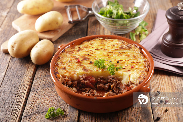 baked mashed potato with minced beef and salad