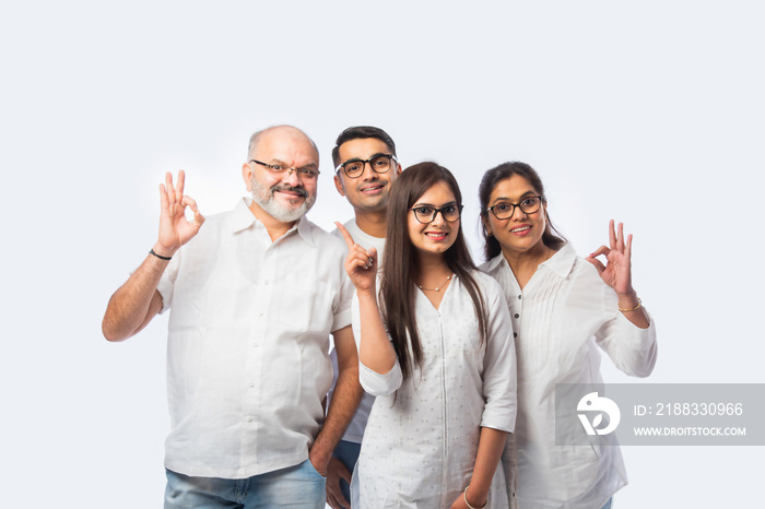 Closeup portrait of Asian Indian family with trendy eye glasses