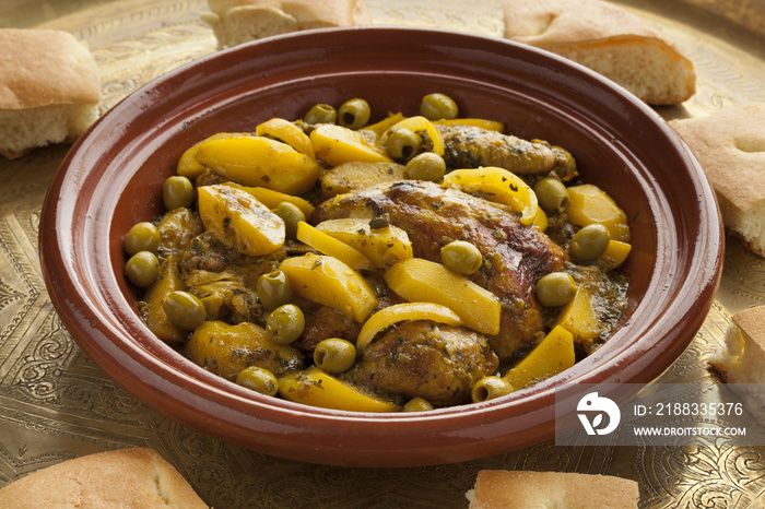 Moroccan tajine with chicken,pototoes and olives