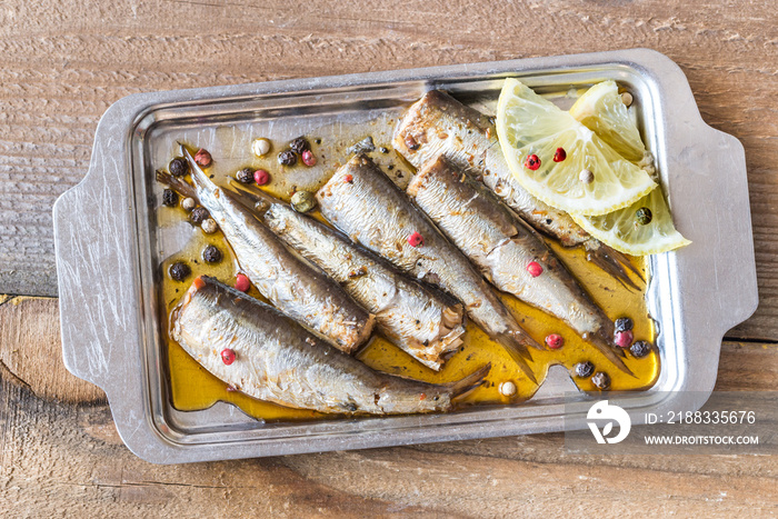 Sardines on the metal plate