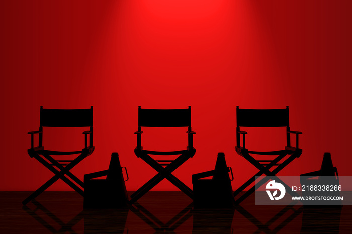 墙前红色背光的导演椅、电影拍手器和扩音器。三维渲染