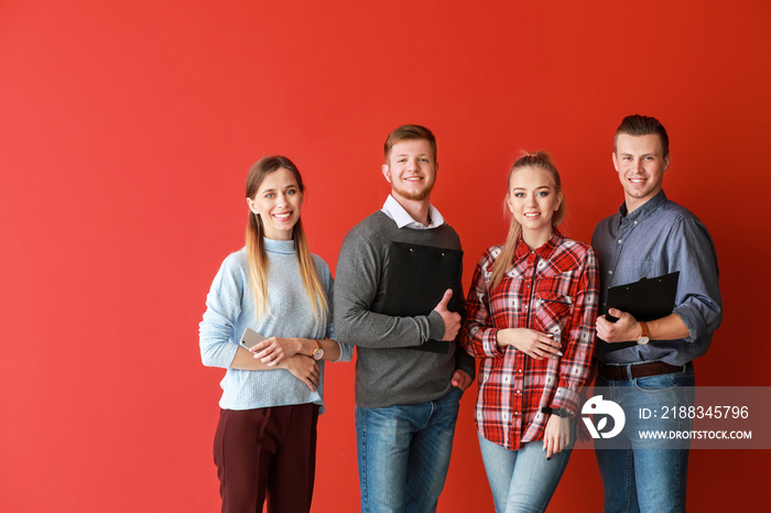 Group of young business people on color background