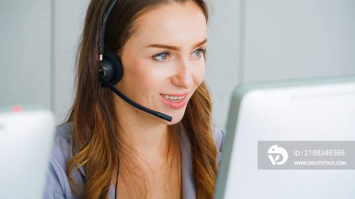 Business people wearing headset working in office to support remote customer or colleague. Call cent