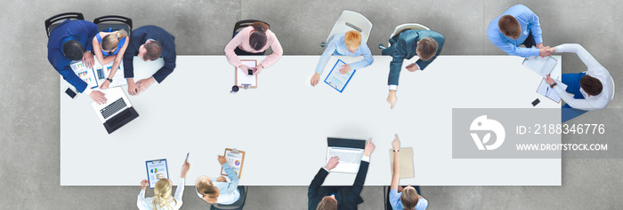 Business people sitting and discussing at business meeting, in office