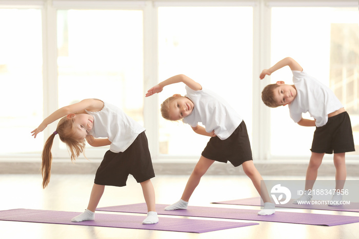 Group of children doing gymnastic exercises