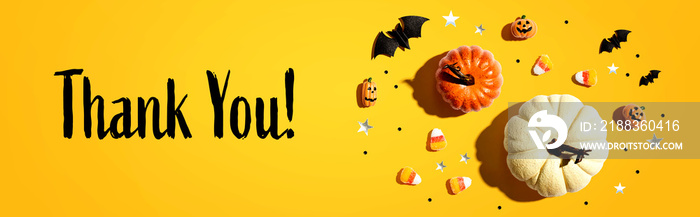 Thank you message with pumpkins and Halloween decorations - flat lay