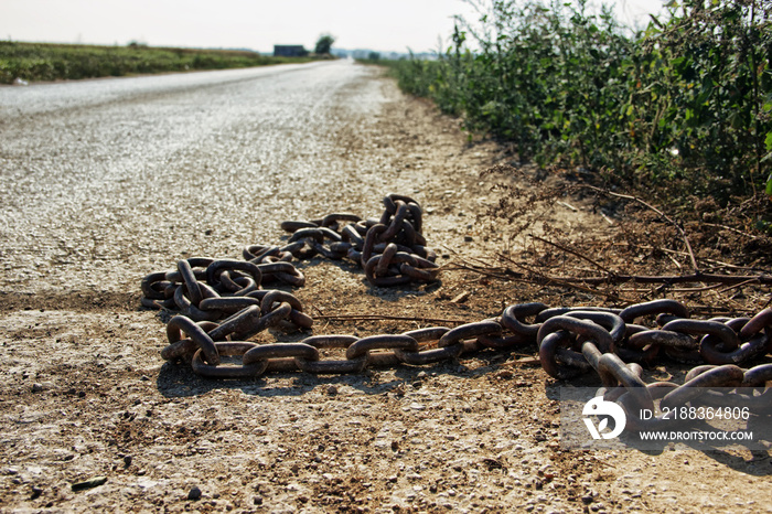 Rusty Metal Chain on Concrete Floor-Breaking Free Concept