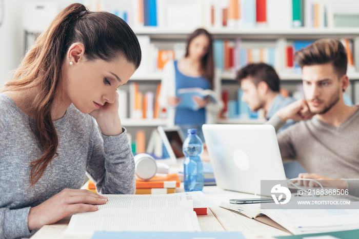 Group of teenagers studying together