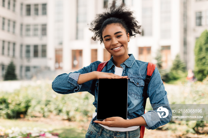 Black College Student Girl Showing Tablet Empty Screen Standing Outdoors