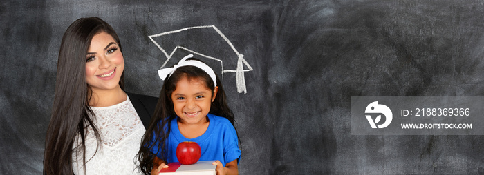 Hispanic Teacher With A Student At School