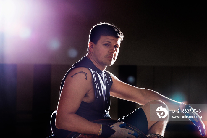 Wheelchair rugby player with shoulder tattoo