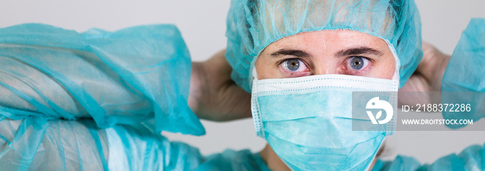 女医生戴防护口罩抵御冠状病毒。横幅全景医护人员预防