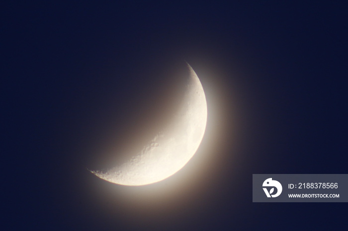 Waxing Crescent Moon Against a Blue Sky