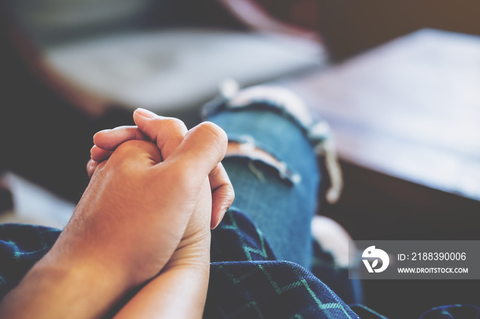 Lover couple holding each other hands in vintage cafe