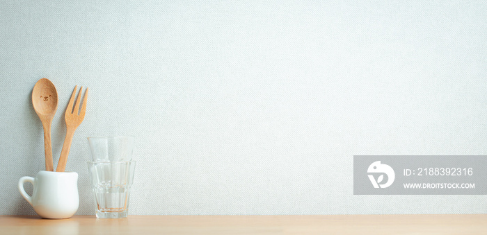 kitchenware decoration on wooden shelf with copy space