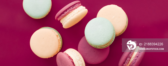 French macaroons on cherry pink background, parisian chic cafe dessert, sweet food and cake macaron 