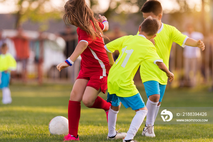 Young children players football match on soccer field