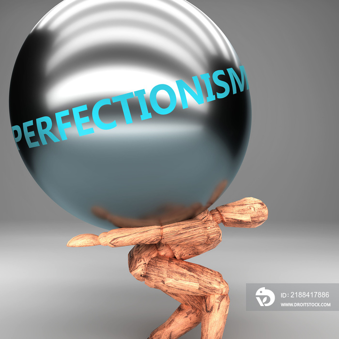 完美主义是肩上的负担和重量——用钢球上的完美主义这个词来象征