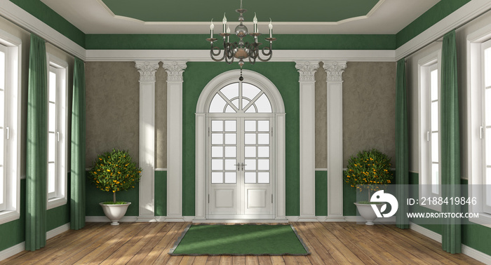 Green and brown home entrance of a luxury villa