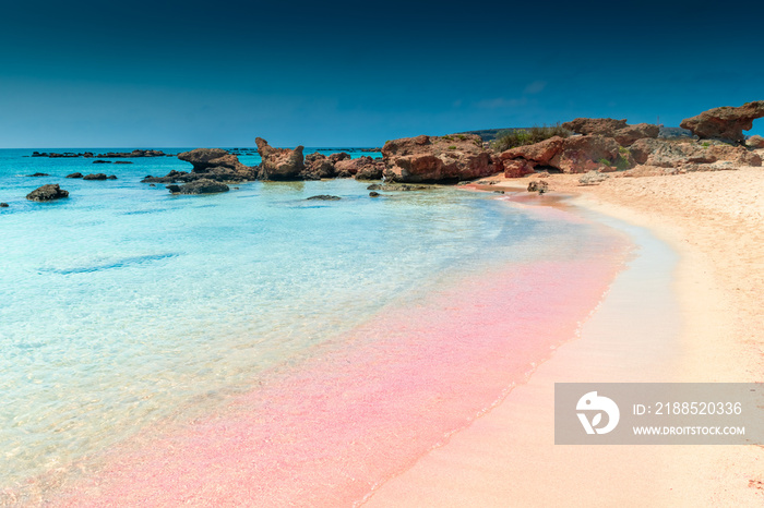 Amazing pink sand beach with crystal clear water in Elafonissi Beach,  Crete, Greece