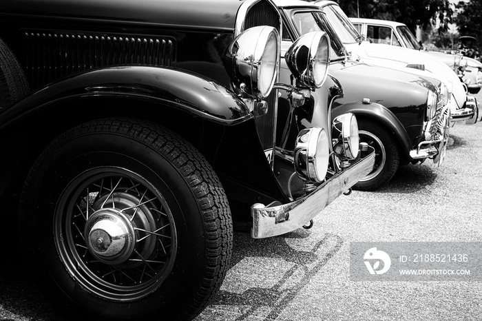 Black and white photo of classic car - vintage film grain filter effect styles