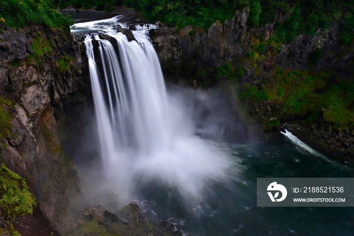 Scenic waterfall, rocks and forest. Snoqualmie Falls is one of Washington state’s most popular scenic attractions.  Seattle. North Bend. WA. United States of America.