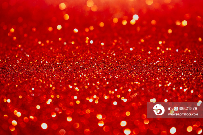 Abstract red shimmering glitter christmas background.