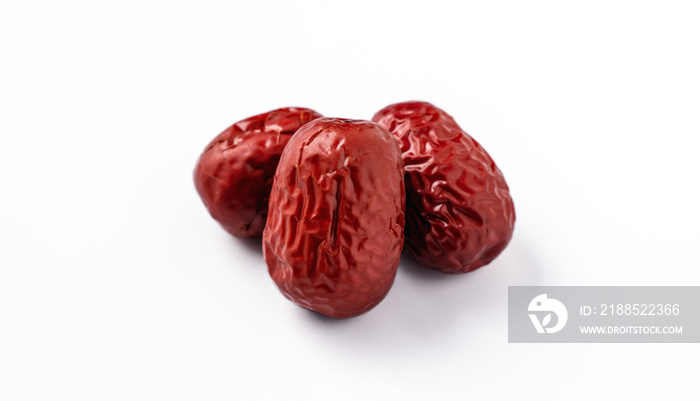 Close up of red dates (jujube) isolated on white background.