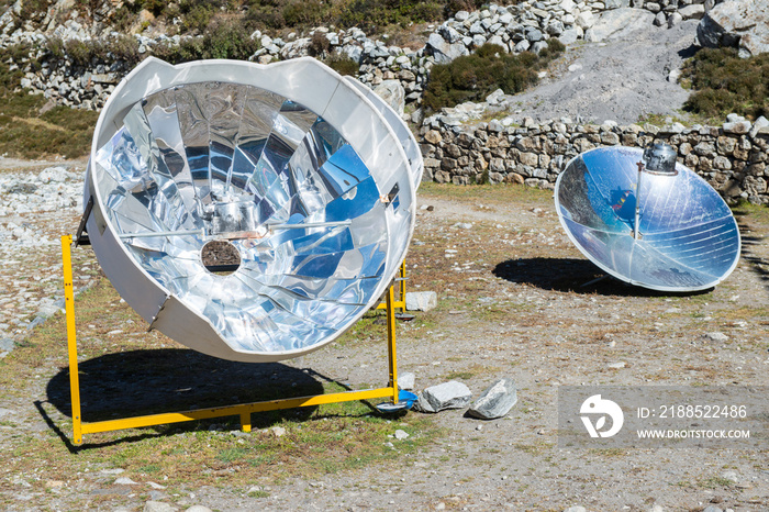 A solar cooker uses the energy of the sun to cook, reducing deforestation in remote areas of Nepal.