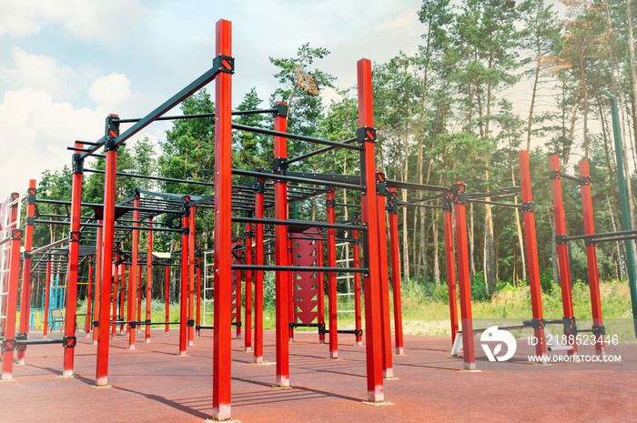 A beautiful modern fitness equipment outdoors. Gym at the sports ground. Close-up