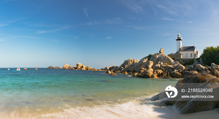 view of the Pontusval lighthouse and bay on the north coast of Brittany in France