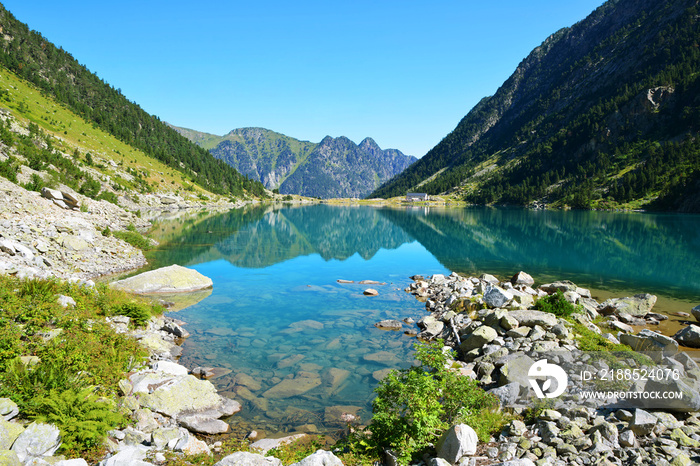 Gaube lake near village Cauterets in the Hautes-Pyrenees department, France, Europe. Beautiful mountain landscape in summer day.