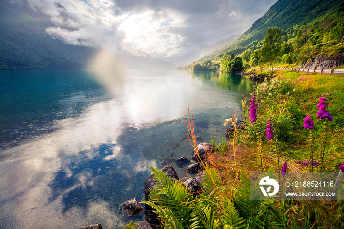 Dramatic summer view of Lovatnet lake, municipality of Stryn, Sogn og Fjordane county, Norway. Colorful rainy scene in Norway. Beauty of nature concept background.