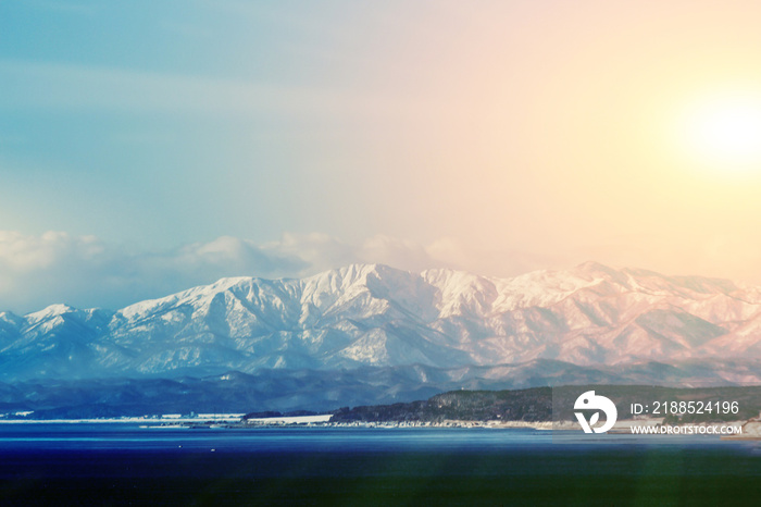 soft focus snow mountain with sunset in Hakodate, Hokkaido in Japan