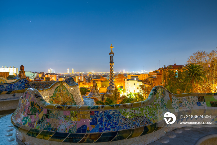 Barcelona at night seen from Park Guell. Park was built from 1900 to 1914 and was officially opened as a public park in 1926. In 1984, UNESCO declared the park a World Heritage Site