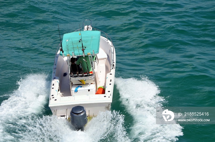 Fishing boat speeding on the Florida Intra-Coastal Waterway off Miami Beach