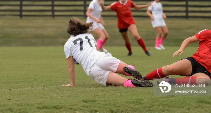 Teenage Girl Tackles During Soccer Game